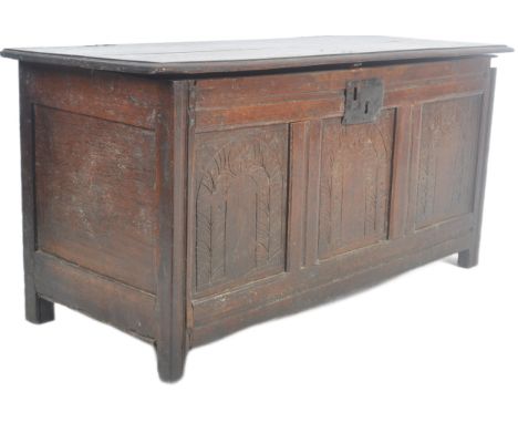 A 19th Century carved oak coffer blanket box storage chest trunk. Carved fielded panels to the front with the hinged lid open