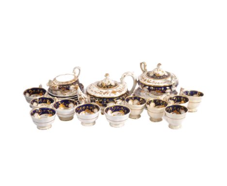 A 19th Century English tea service set in the manner of Worcester. Comprises teapot, lidded sugar bowl, milk jug 11 cups and 