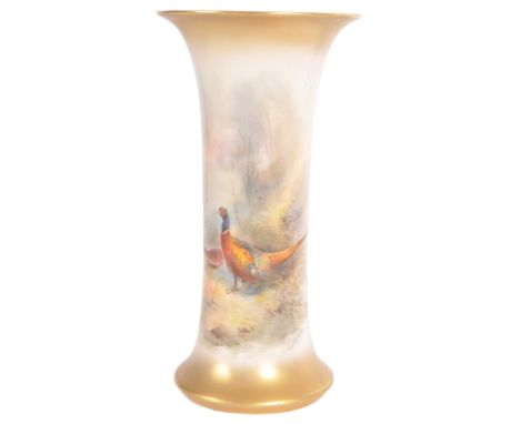 A Royal Worcester hand painted porcelain game bird series cabinet vase by James Stinton model 923,. Tapered trumpet form with