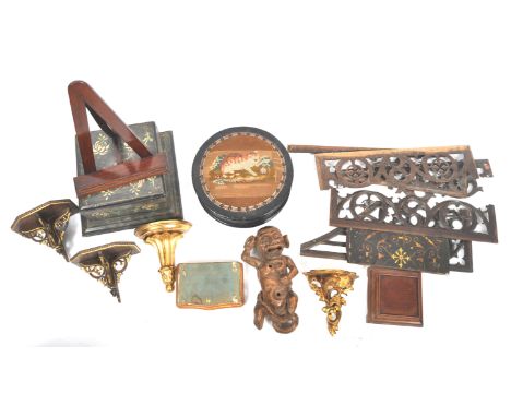 A collection of 18th and 19th century ecclesiastical carvings and objects.&nbsp; To include an early root carving of a grotes