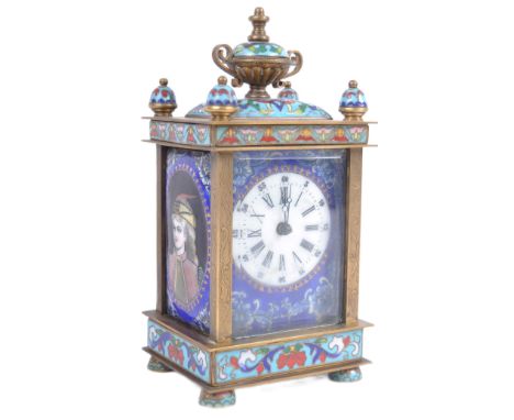 A 19th Century French gilded brass and champlevé enamel (cloisonné) carriage clock. Pagoda top with raised central urn flanke