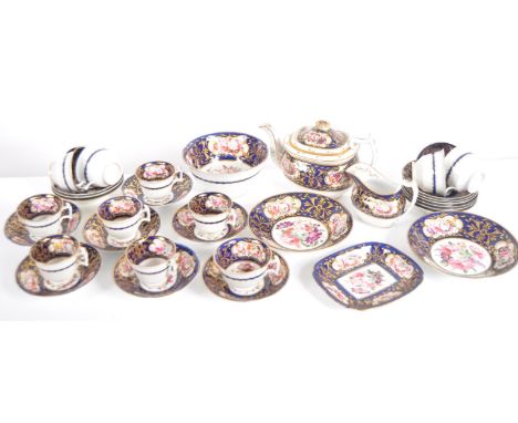 A 19th Century Spode / Coalport / Worcester manner hand painted tea service / tea set. Decorated in cobalt with gilt details 
