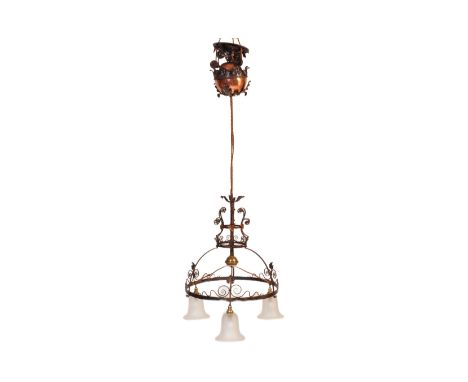 An early 20th Century copper &amp; wrought iron ceiling light lamp fixture having a scrolled frame with glass tulip shades an