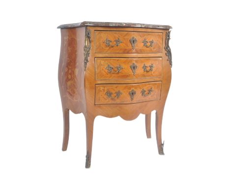 A 20th Century French style walnut &amp; marble commode chest of drawers. The bank of drawers being serpentine bombe form wit