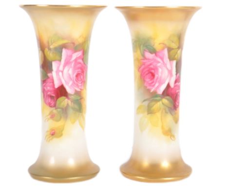 A pair of Royal Worcester hand painted porcelain cabinet vases by Millie Hunt model 923. Tapered trumpet form with hand paint