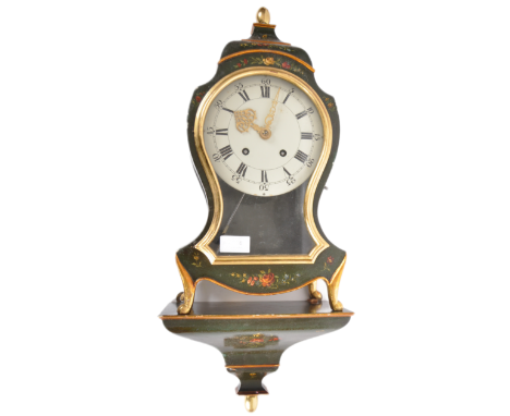 A 20th Century painted bracket clock on matching wall bracket shelf. Large glazed door with gilt details and hand painted flo