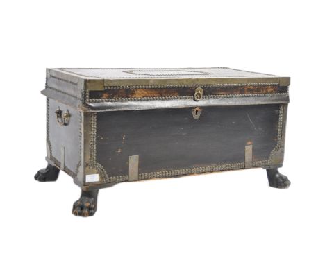 An early 19th Century George III Regency period leather and brass bound campaign travel trunk having brass stud detailing. Hi