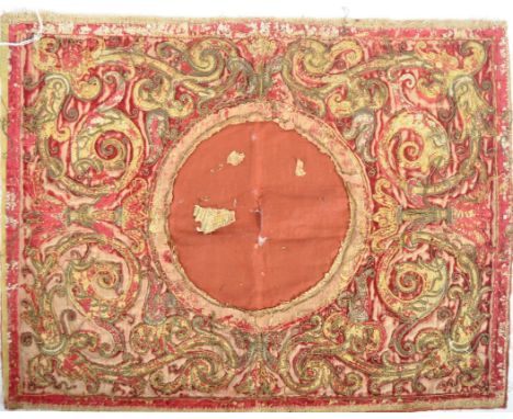 A 16th century Tudor tapestry panel with scrolled and foliate design to the border with inter woven allucciolato effect boucl