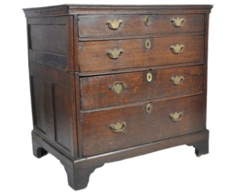 17th century oak and elm commonwealth chest of drawers. Raised on bracket feet with graduating four deep drawer configuration