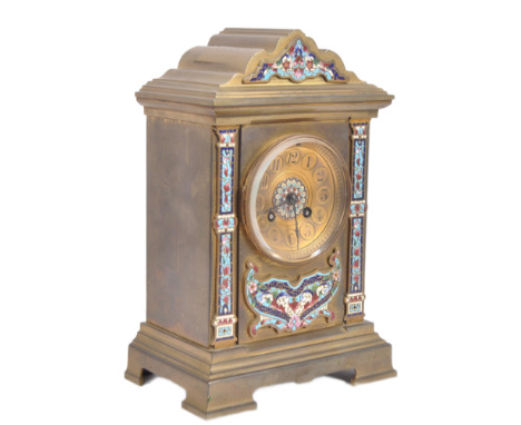 A 19th Century French Champlevé enamel cloisonné work mantel clock having a gilded / lacquered brass case. Arched top with be