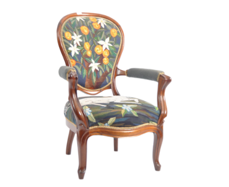 A 19th Century French Empire mahogany fauteuil armchair. Broad tall backrest with overstuffed cushioned seat finished in tape