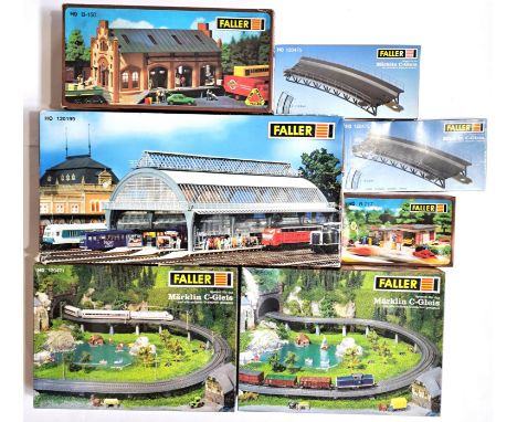 Faller, a boxed group of HO scale railway related plastic kits to include 120199 Covered Platform, 120470 Access Ramp Set and