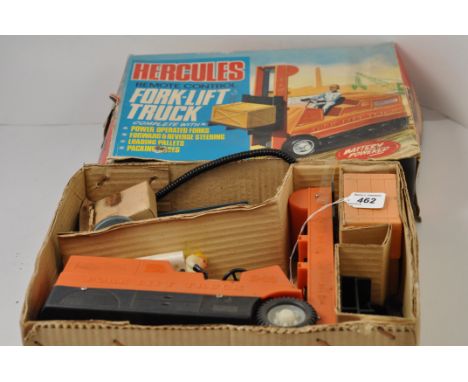 VINTAGE (1966) EMPIRE MADE HERCULES REMOTE CONTROL FORK LIFT TRUCK WITH INSTRUCTIONS AND SHABBY BOX