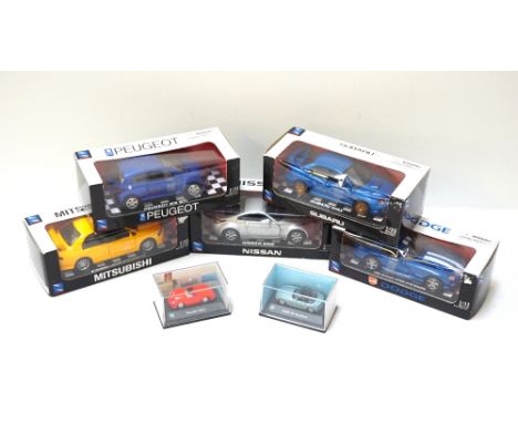 FIVE 'NEW-RAY TOYS CO.' DIE-CAST MODEL VEHICLEScomprising a '1996 Dodge Viper GTS Coupe'; 'Mitsubishi Lancer Evolution VII'; 