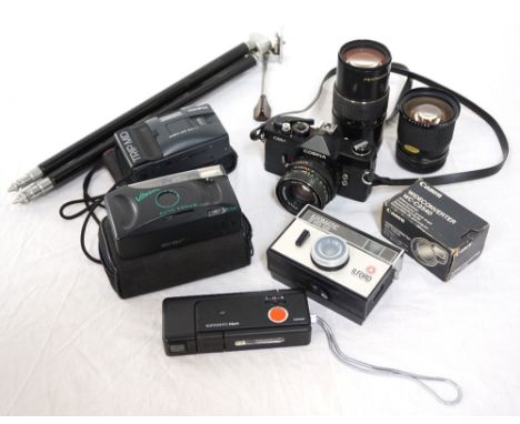 COSINA 35MM CAMERAwith a 1.8/50 Pentacan lens, Ensinor zoom 80mm lens, cased, Vivitar 70-150mm lens, cased, an adjustable met