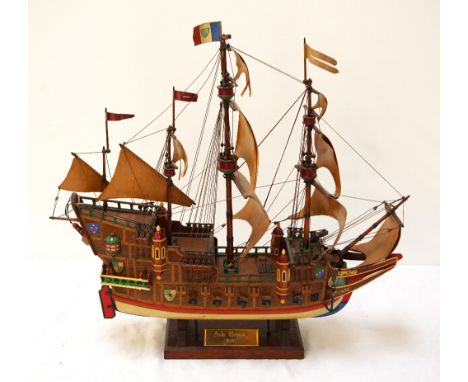 DETAILED WOODEN MODEL OF THE ORIGINAL ARK ROYALin full sail with rigging and gun ports raised, on stand with engraved brass p
