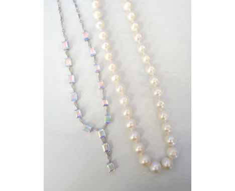 LARGE PEARL NECKLACEwith fourteen carat gold clasp, 46cm long; together with a mystic topaz necklace in silver (2)