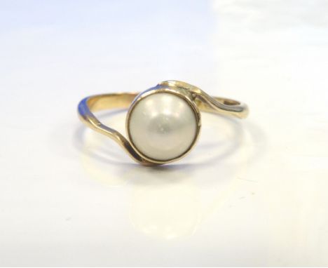 PEARL DRESS RINGon fifteen carat gold shank with twist setting, ring size P-Q