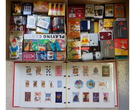 LARGE COLLECTION OF PLAYING CARDSwith a variety of subjects and packs, together with an album of playing cards and the book '