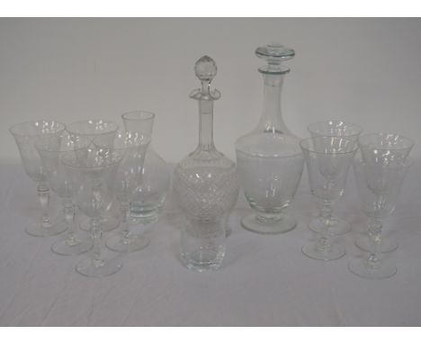 GLASS WINE SETwith etched body decoration, comprising eleven glasses; two decanters with stoppers; and a carafe with glass (1