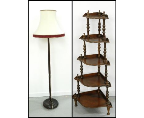 MAHOGANY CORNER WHATNOTwith five graduated and shaped shelves supported by turned columns, 129.5cm high; together with an oak