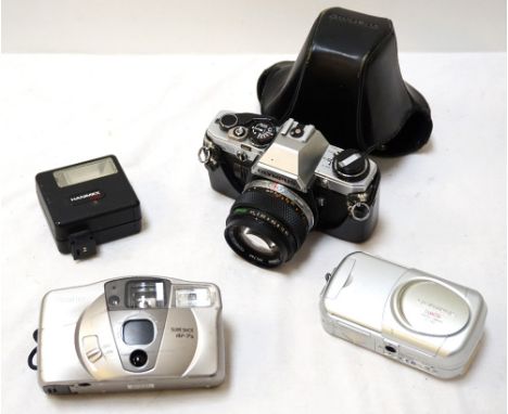 'OLYMPUS OM10' CAMERAwith 'Auto-S 1:1,4 f=50mm' lens, with case, an Olympus digital camera D-390, a Canon Sure Shot AF-7s cam