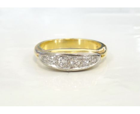 GRADUATED DIAMOND SIX STONE RINGon heavy eighteen carat gold shank, the diamonds totalling approximately 0.35cts, ring size Q