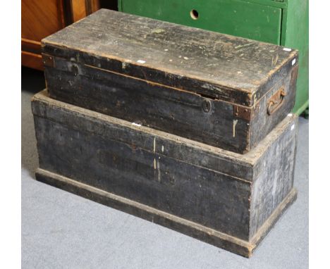 Two vintage black painted deal tool chests, 84cm & 76cm wide, containing various hand tools; & various sections of veneer.