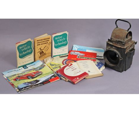 A vintage BR (M) M railway lantern, w.a.f., 36cm high; & various books & booklets on motor cars. 