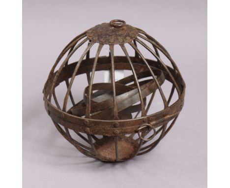 An antique-style ship’s cast-iron gimbal whale oil lamp, 21cm diameter. 