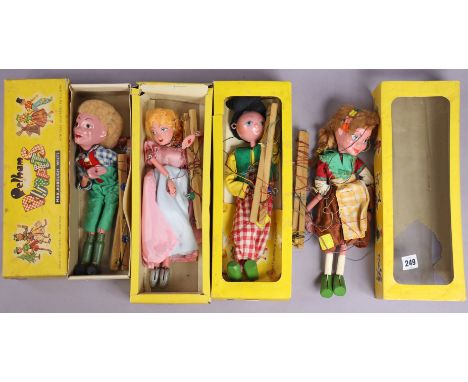 Three Pelham string puppets – “Cinderella”, “Dutch Boy”, &amp; “Hansel”, all boxed; &amp; another Pelham string puppet “Greta