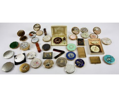 Large collection of Stratton and other vintage compacts with various designs  including Yacht under sail, musical instruments