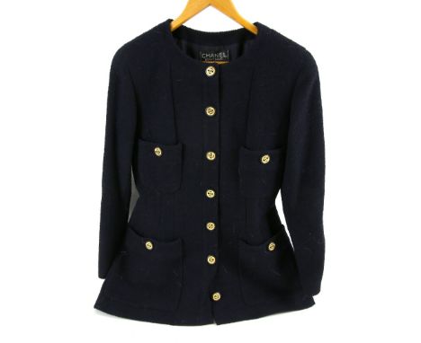 Navy blue vintage Chanel Boutique collarless silk lined jacket with handwritten label and gilt buttons size 40..    