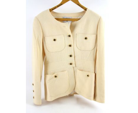 Vintage Chanel cream ladies suit, silk lined with gilt buttons size 40, .    