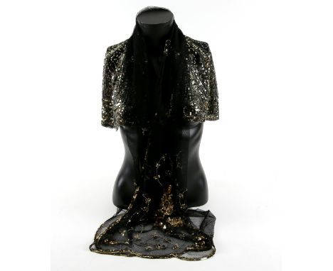  1920s black evening shoulder cape with intricate sequin, star and bugle bead decoration on a black net ground, and a black n