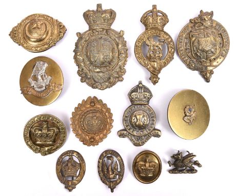 A small quantity of harness and carriage mounts, including a large brass item with Royal Arms and Vic crown, another with fam