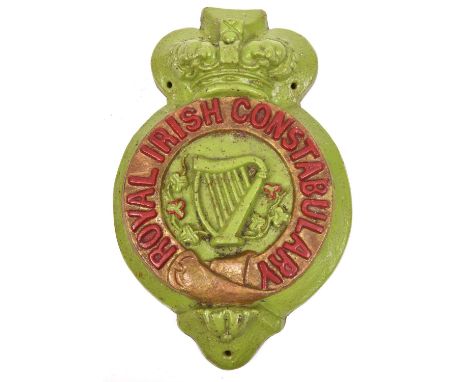 An impressive Victorian Royal Irish Constabulary heavy cast iron wall plaque, 15" x 9", embossed "Royal Irish Constabulary" a
