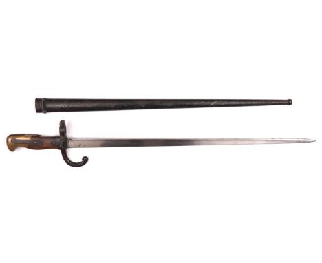 A French 1874 pattern Gras bayonet, the blade dated St Etienne 1877, in its scabbard. Generally GC (the crossguard and scabba