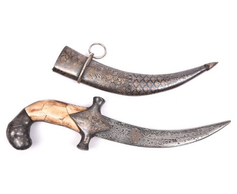 A small Indian dagger, with curved blade 7" of watered steel, silver damascened hilt with bone or ivory grips, its damascened