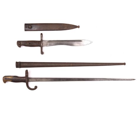 An 1874 Gras bayonet, the blade marked "Waffenfabrik Steyr 1881", in its scabbard; and a Spanish 1941 Bolo bayonet, in its sc