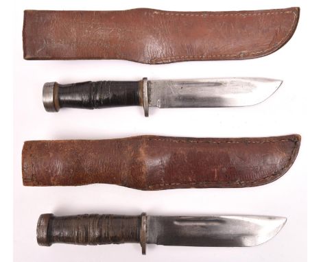 Two American military style hunting knives, blades 6" marked "Cattaraugus 225Q" with leather grips, steel crossguards and che