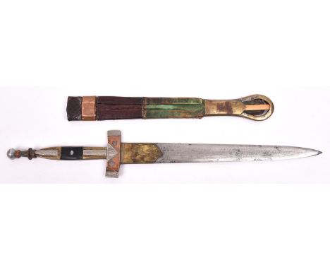 An African dagger with brass and copper mounts, in its sheath of leather with metal mounts. GC £20-25 