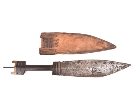 An African dagger, broad DE blade 9", brass mounted horn hilt, in its leather scabbard. GC (scabbard worn). £30-50 