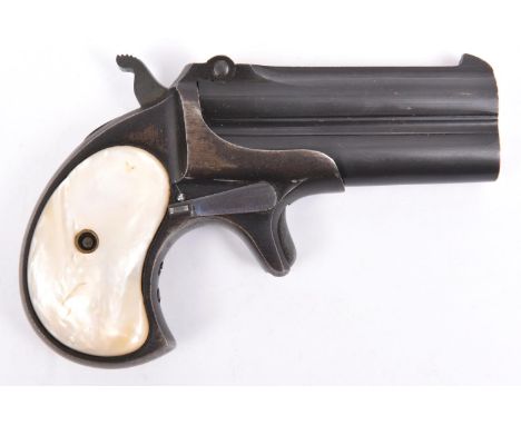 A .38" RF double barrelled over and under derringer pistol, number 773, blued overall with mother of pearl grips. GWO &amp; C