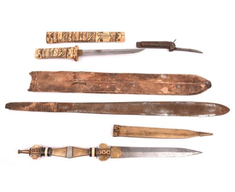 A short Masai type sime; a Japanese bone dagger; a military jack knife and an Arab dagger in a brass sheath.GC (4) £30-35 