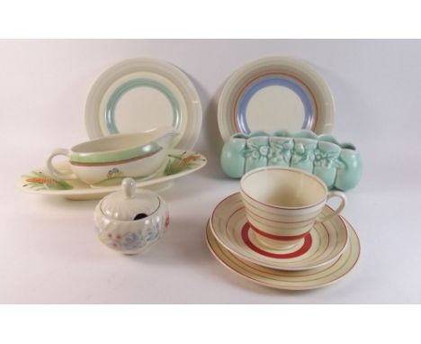 A Clarice Cliff banded trio and four other items of Clarice Cliff