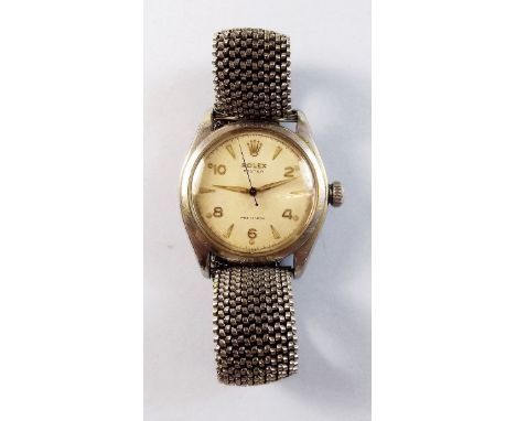 A Rolex Oyster Precision Stainless Steel gentleman's vintage wrist watch with Arabic and baton numerals