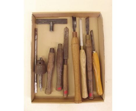 A group of woodworkers lathe tools and rest with chuck