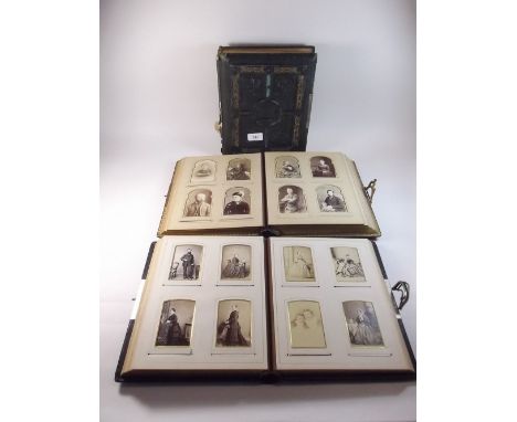 Two Victorian leather bound photograph albums and contents of portrait photographs and another album