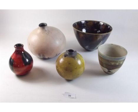 Four items of studio pottery and a Poole vase
